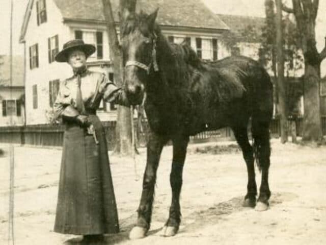 Jennie Powers with a horse.