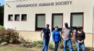 MHS staff members outside of the MHS building.