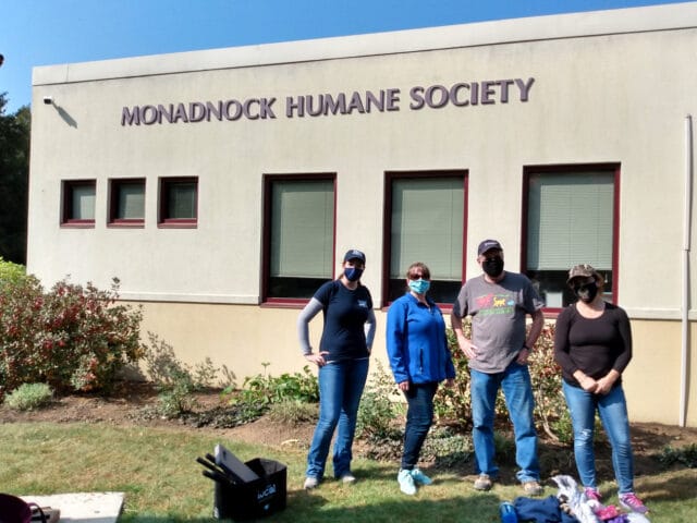 MHS staff members outside of the MHS building.